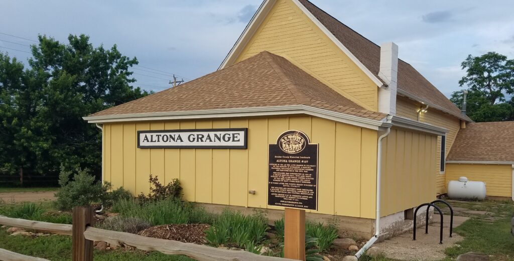 historic plaque in front of Altona Grange